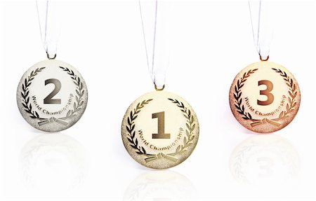podium first - Gold, silver and bronze medals isolated over a white background Stock Photo - Budget Royalty-Free & Subscription, Code: 400-04369989