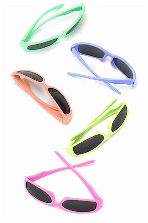 Collection of colorful sunglasses on white background Stock Photo - Budget Royalty-Free & Subscription, Code: 400-04360371