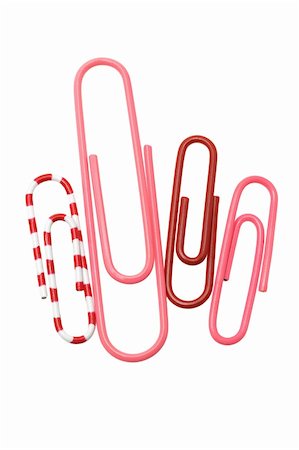 simsearch:400-05215797,k - Four color paper clips on white background Foto de stock - Super Valor sin royalties y Suscripción, Código: 400-04360424