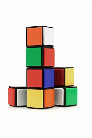 plastic blocks - Multicolor building blocks arranged on white background Stock Photo - Budget Royalty-Free & Subscription, Code: 400-04360448
