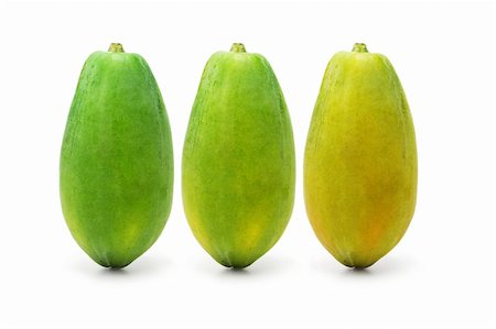 Three ripening papaya fruits on white background Stock Photo - Budget Royalty-Free & Subscription, Code: 400-04360441