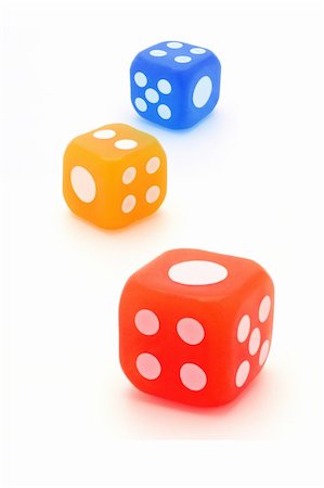 simsearch:400-04003790,k - Three colorful rubber dice on white background Stockbilder - Microstock & Abonnement, Bildnummer: 400-04360454