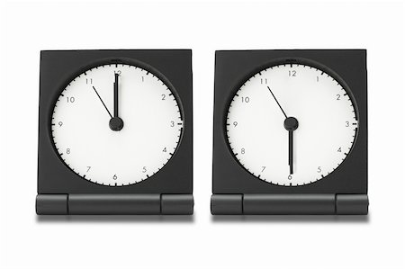 simsearch:700-05974049,k - Travel electronic alarm clocks on white background Stock Photo - Budget Royalty-Free & Subscription, Code: 400-04360451