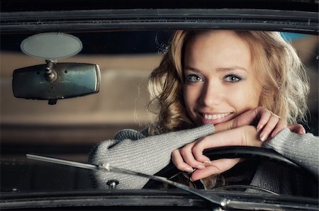 simsearch:6109-06781856,k - pretty young girl in an old car Stock Photo - Budget Royalty-Free & Subscription, Code: 400-04360930