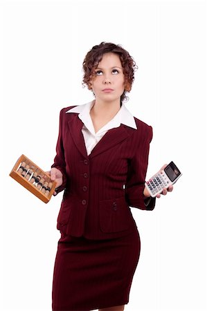 business woman holding wooden abacus and calculator.What to choose? Foto de stock - Super Valor sin royalties y Suscripción, Código: 400-04361283