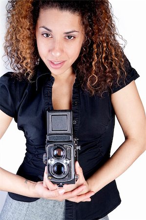 Young Woman with a vintage antique camera Stock Photo - Budget Royalty-Free & Subscription, Code: 400-04362760