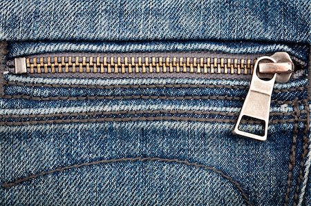 Closeup shot of jeans zipper Stock Photo - Budget Royalty-Free & Subscription, Code: 400-04362994