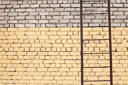 paint stairs - Wall of an old house with a ladder. Stock Photo - Budget Royalty-Free & Subscription, Code: 400-04362998