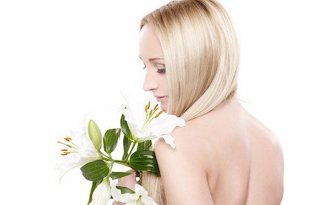 simsearch:400-09081321,k - Closeup portrait of female model holding white orchid Stock Photo - Budget Royalty-Free & Subscription, Code: 400-04363108