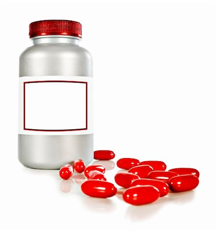 a Bottle of red pills for joy on a white background with space for text Stock Photo - Budget Royalty-Free & Subscription, Code: 400-04363172