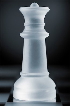simsearch:400-04398584,k - glass chess queen is standing on board in dark Fotografie stock - Microstock e Abbonamento, Codice: 400-04374305