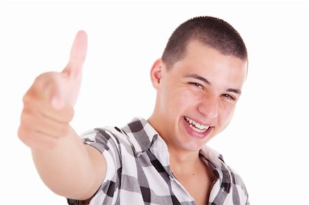 simsearch:400-04643781,k - Portrait of a handsome young man smiling, with a thumbs up gesture. Foto de stock - Super Valor sin royalties y Suscripción, Código: 400-04374866