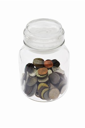 simsearch:400-05289499,k - assortment of Coins in glass jar on white background Photographie de stock - Aubaine LD & Abonnement, Code: 400-04375483