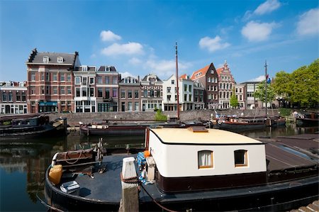 houseboats and barges in canal in delfshaven, netherlands Stock Photo - Budget Royalty-Free & Subscription, Code: 400-04375516