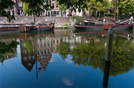 reflection of authentic facades in a canal in delfshaven, netherlands Stock Photo - Budget Royalty-Free & Subscription, Code: 400-04375519