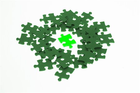 simsearch:400-04811369,k - Isolated piece of luminous green jigsaw puzzle on white background Stock Photo - Budget Royalty-Free & Subscription, Code: 400-04375510
