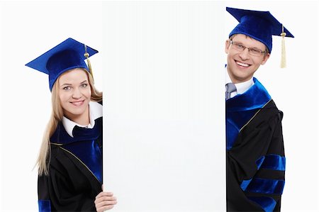 Young Masters with an empty billboard on a white background Stock Photo - Budget Royalty-Free & Subscription, Code: 400-04375701