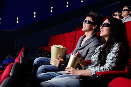Young attractive people in the cinema Stock Photo - Budget Royalty-Free & Subscription, Code: 400-04375715