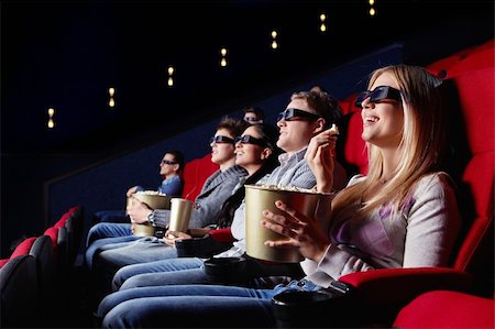 Smiling people in 3D glasses in cinema Stock Photo - Budget Royalty-Free & Subscription, Code: 400-04375719