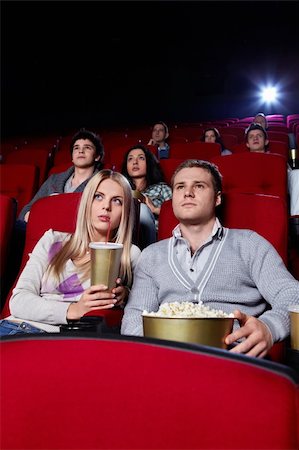 Young people watch movies in cinema Stock Photo - Budget Royalty-Free & Subscription, Code: 400-04375712
