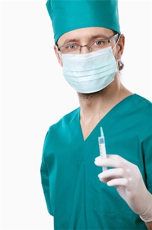 simsearch:400-04375768,k - The anesthesiologist keeps the syringe on white background Foto de stock - Royalty-Free Super Valor e Assinatura, Número: 400-04375770