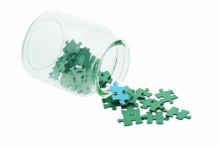 simsearch:400-05289499,k - Blue piece among all green jigsaw puzzles spilled from glass bottle Foto de stock - Super Valor sin royalties y Suscripción, Código: 400-04376177
