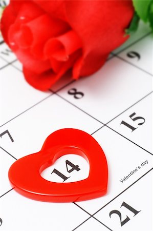 Red heart shape marker and rose on calendar page showing Febraury 14 Valentine's day Photographie de stock - Aubaine LD & Abonnement, Code: 400-04376245