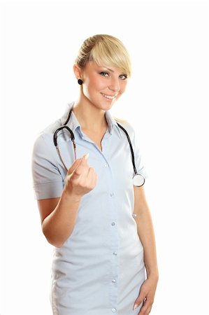 sunny_baby (artist) - Closeup of an attractive young woman doctor with a smile Foto de stock - Royalty-Free Super Valor e Assinatura, Número: 400-04376261
