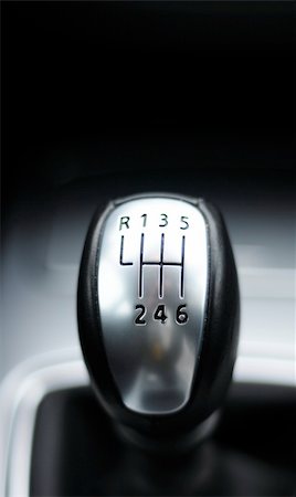 fast forward - sports car gear shift stick with copyspace for text message Stock Photo - Budget Royalty-Free & Subscription, Code: 400-04376299