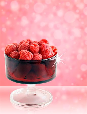 plumb - So good they sparkle: sweet,delicious and healthy raspberries in a vintage red colored glass bowl on fun pink background Stock Photo - Budget Royalty-Free & Subscription, Code: 400-04377132