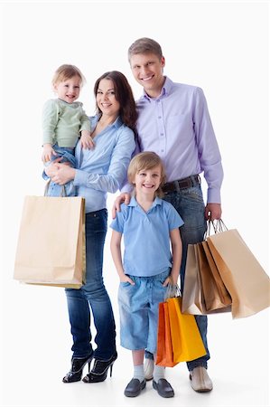 simsearch:400-04323202,k - Family with shopping bags on a white background Stock Photo - Budget Royalty-Free & Subscription, Code: 400-04377616