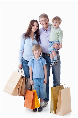simsearch:400-04323202,k - Family with shopping on white background Stock Photo - Budget Royalty-Free & Subscription, Code: 400-04377617