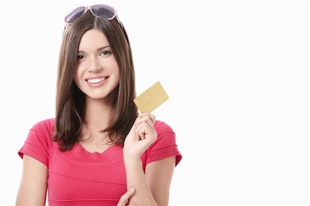 Young girl with bags and credit card on a white background Stock Photo - Budget Royalty-Free & Subscription, Code: 400-04377611