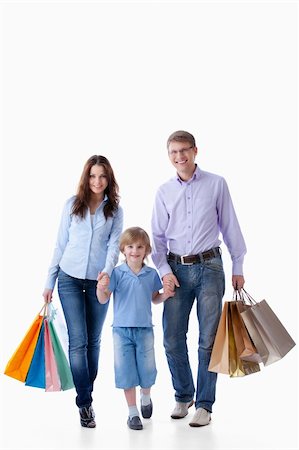 simsearch:400-04323202,k - Family with shopping bags on a white background Stock Photo - Budget Royalty-Free & Subscription, Code: 400-04377613