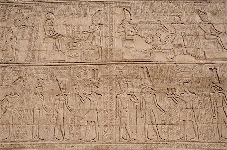 simsearch:400-05739807,k - Hieroglyphic carvings on a wall at the Egyptian Temple of Khnum in Esna Foto de stock - Super Valor sin royalties y Suscripción, Código: 400-04378471