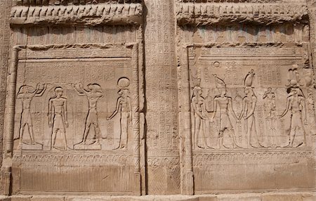simsearch:400-05739807,k - Hieroglyphic carvings on a wall at the Egyptian Temple of Khnum in Esna Foto de stock - Super Valor sin royalties y Suscripción, Código: 400-04378472