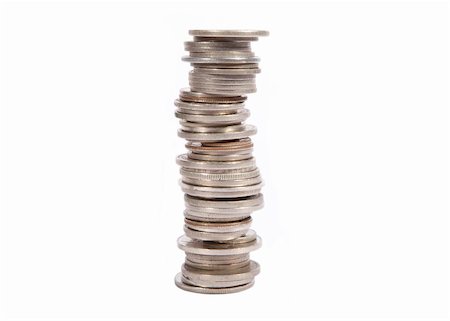 piles of cash pounds - Stacked old silver coins on white background Photographie de stock - Aubaine LD & Abonnement, Code: 400-04379250