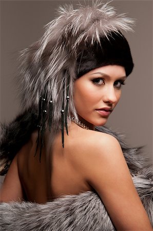 beautiful young woman in a fur hat Stock Photo - Budget Royalty-Free & Subscription, Code: 400-04379371