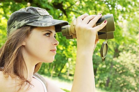 simsearch:400-04632747,k - portrait of girl which looks into the binoculars Fotografie stock - Microstock e Abbonamento, Codice: 400-04379380
