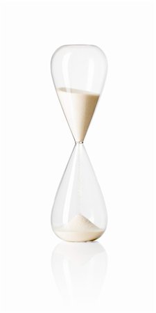 Hourglass isolated on white reflective background. Stock Photo - Budget Royalty-Free & Subscription, Code: 400-04379658