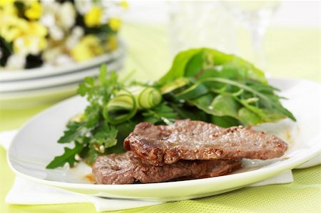 Beef steak with mixed green salad Stock Photo - Budget Royalty-Free & Subscription, Code: 400-04379719