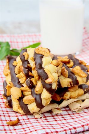 peanut cookie - homemade cookies with chocolate and nuts and a glass of milk Stock Photo - Budget Royalty-Free & Subscription, Code: 400-04379838