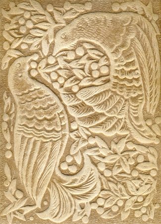 plaster detail not people - Embossed rock ornament with pattern of birds in brown. Stock Photo - Budget Royalty-Free & Subscription, Code: 400-04370481