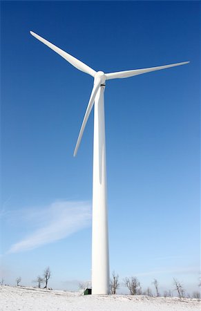 danicek (artist) - View of single windmill generating electricity against blue sky in a winter landscape Foto de stock - Super Valor sin royalties y Suscripción, Código: 400-04371290