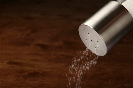 simsearch:400-08154994,k - detail of pouring salt with wooden surface in the background Stock Photo - Budget Royalty-Free & Subscription, Code: 400-04371363