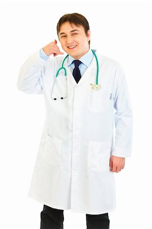 simsearch:400-04351236,k - Smiling medical doctor showing contact me gesture isolated on white Photographie de stock - Aubaine LD & Abonnement, Code: 400-04371568