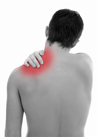 simsearch:400-06476910,k - Young man having pain in his shoulder Stock Photo - Budget Royalty-Free & Subscription, Code: 400-04372053