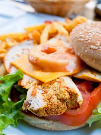 simsearch:400-04331205,k - Cheese burger - American cheese chicken burger with fresh salad Foto de stock - Royalty-Free Super Valor e Assinatura, Número: 400-04372260