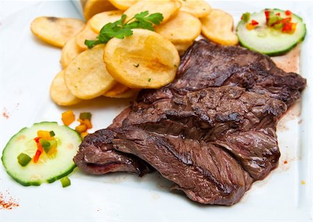 simsearch:400-05664697,k - juicy steak beef meat with tomato and potatoes Stock Photo - Budget Royalty-Free & Subscription, Code: 400-04372274