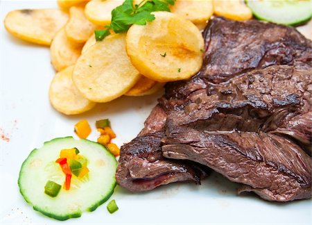 simsearch:400-05664697,k - juicy steak beef meat with tomato and potatoes Stock Photo - Budget Royalty-Free & Subscription, Code: 400-04372273